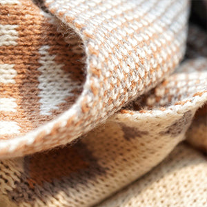 Parchment Geometric Pattern Knit Bohemian Tassel Blanket